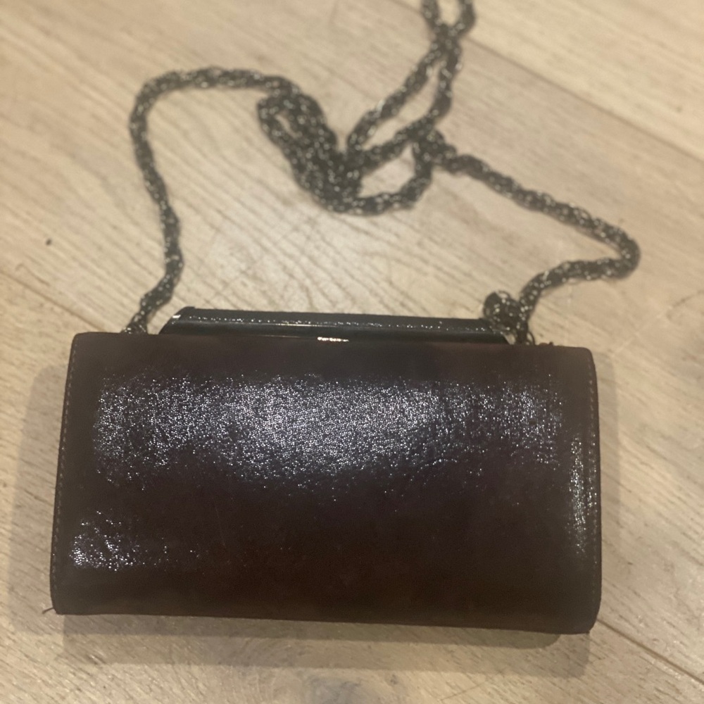 Sleek Brown Leather Clutch with elegant chain
